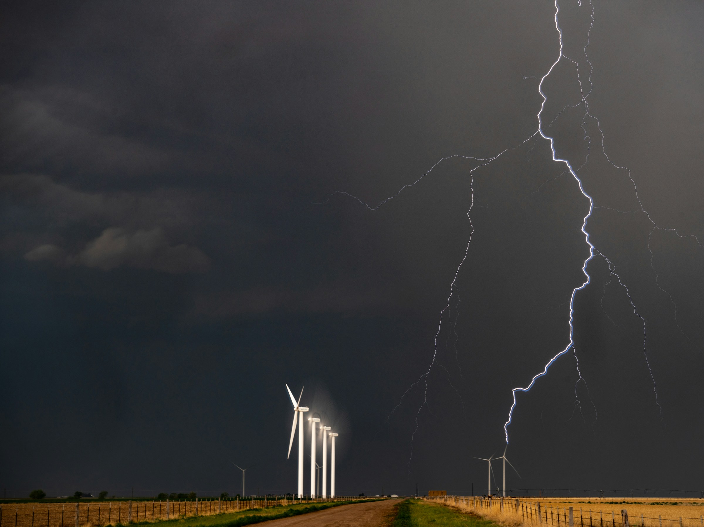 Windfarm in a strom lightning strike